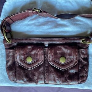 Marc Jacobs Collection mini bag with brass hardware.